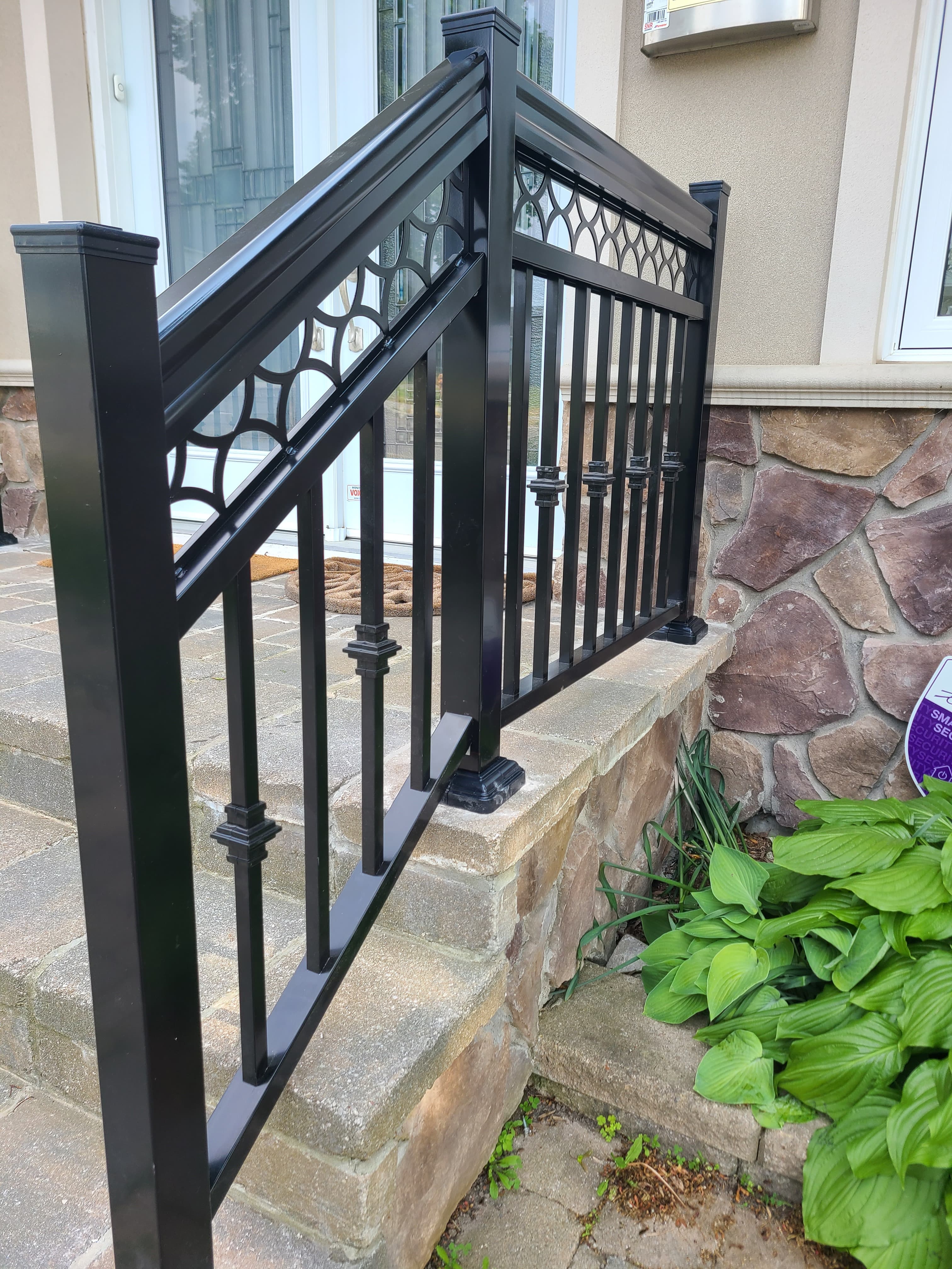 Aluminum gate and column installation on a residential property