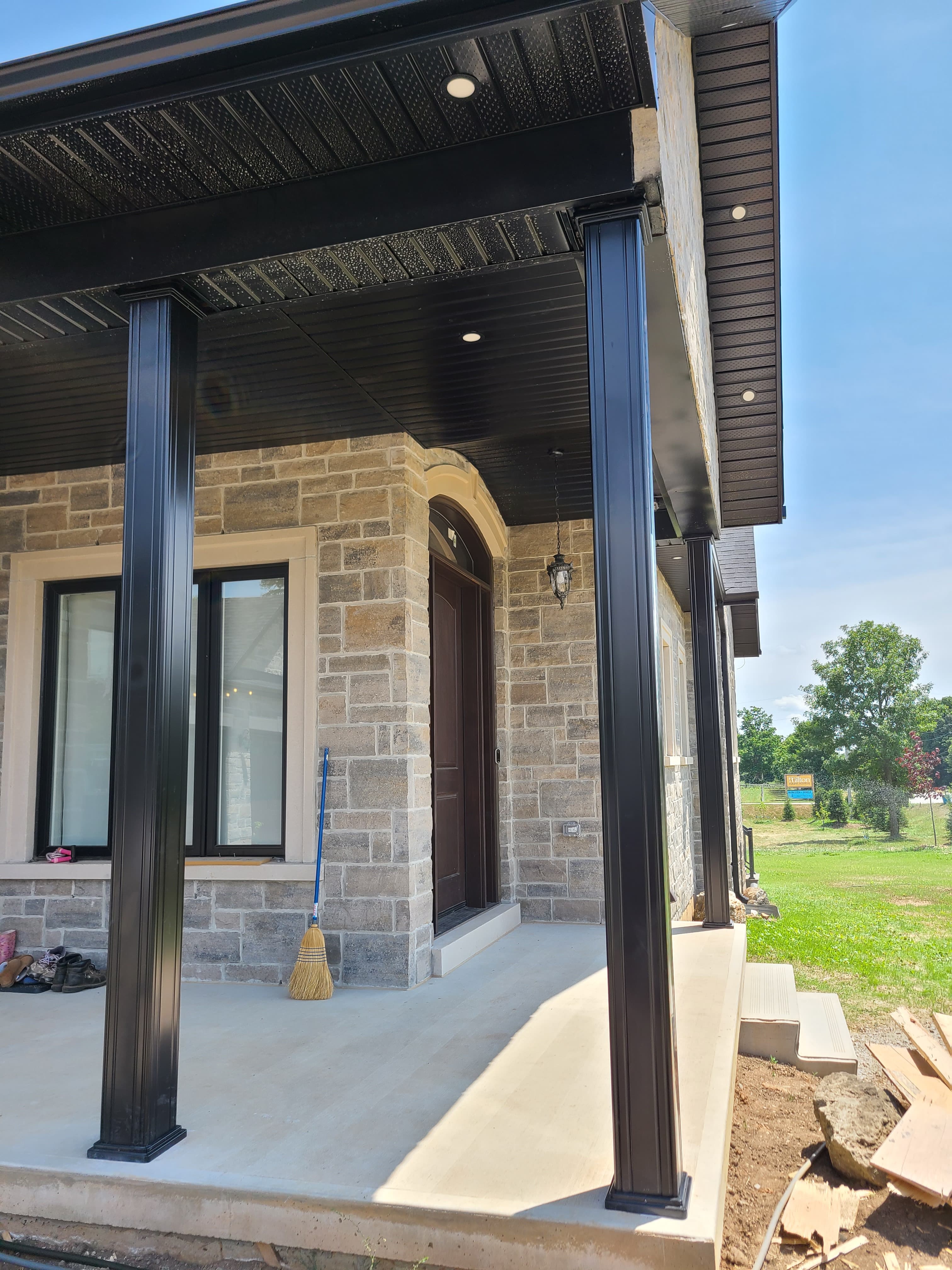 Eight inch square black aluminum porch columns
