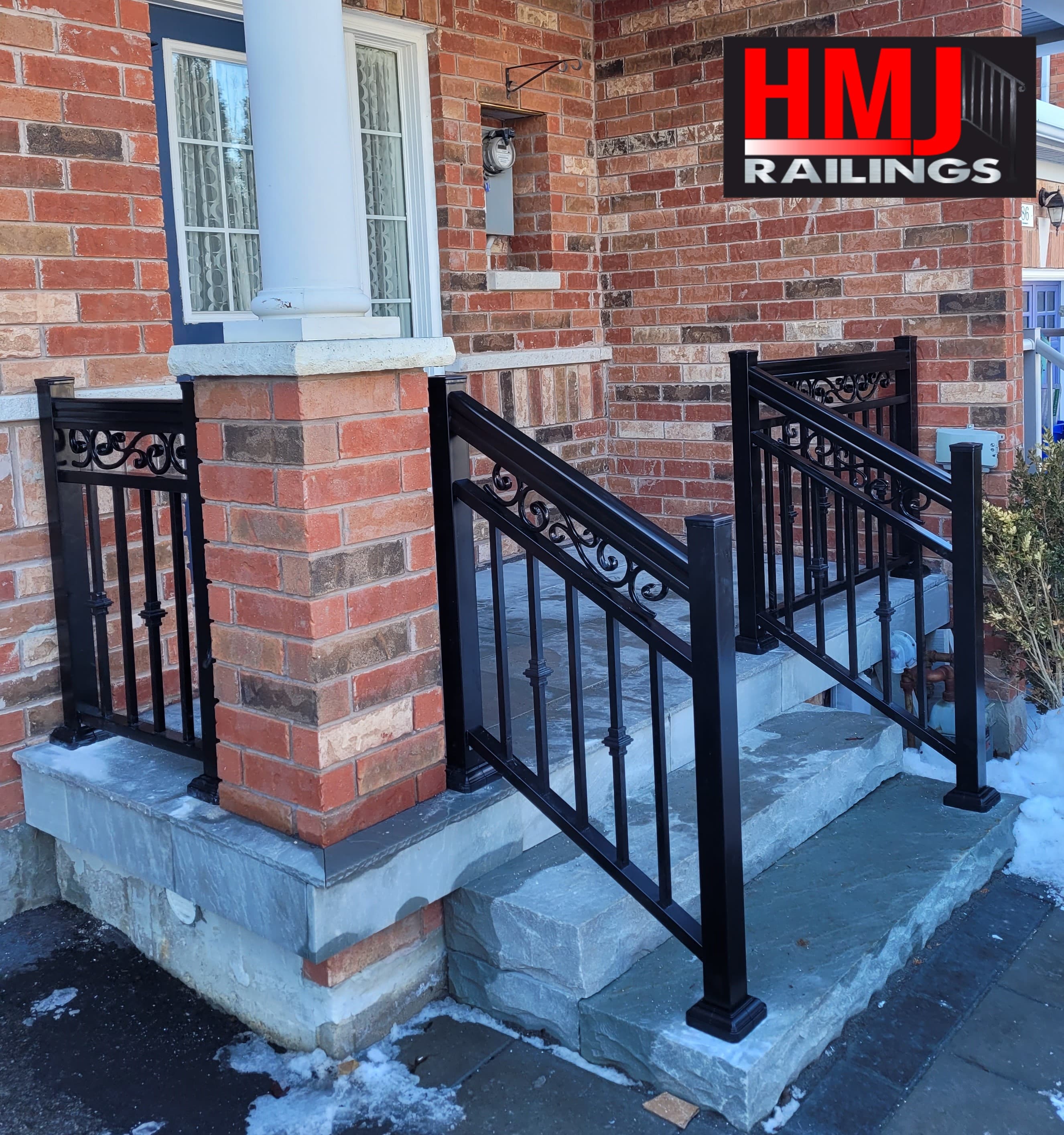 Black aluminum picket railing with decorative collars