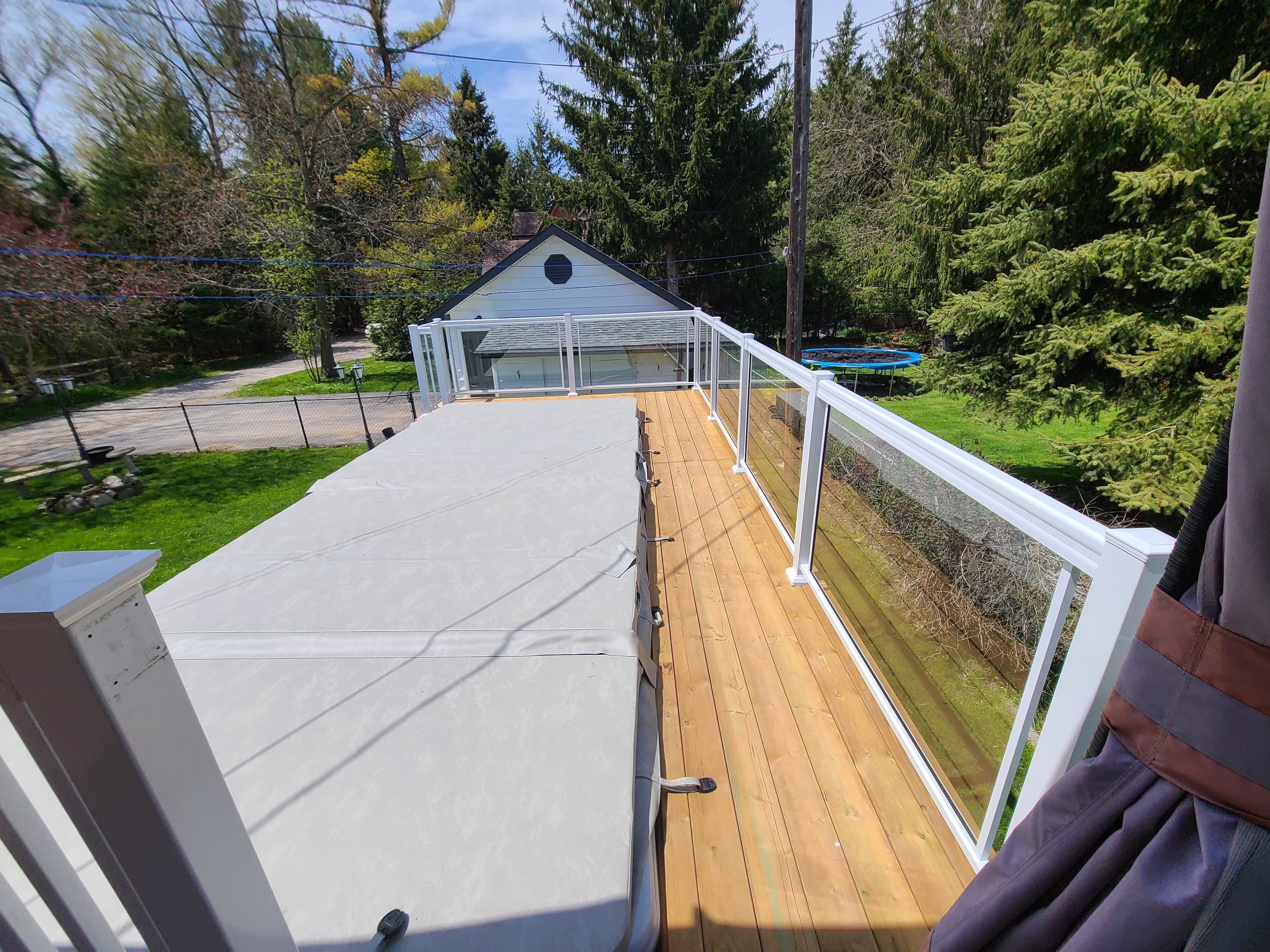 Glass railing on a Mississauga elevated deck