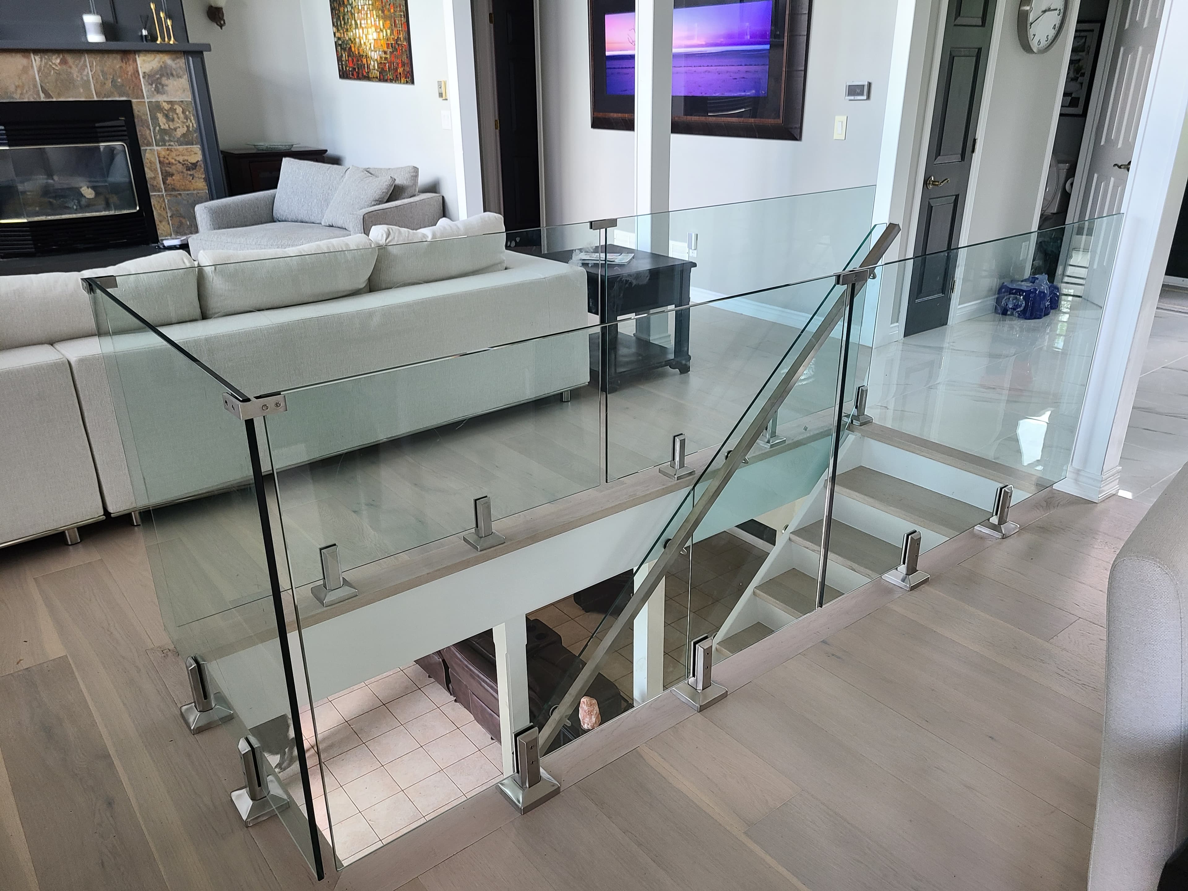 Frameless glass railing on an interior loft space